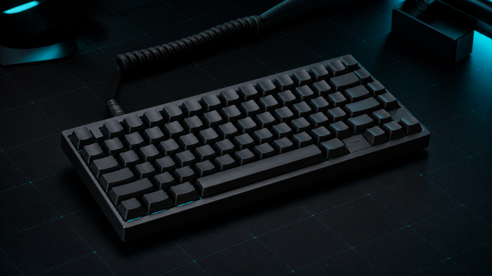 Compact mechanical gaming keyboard on a dark desk