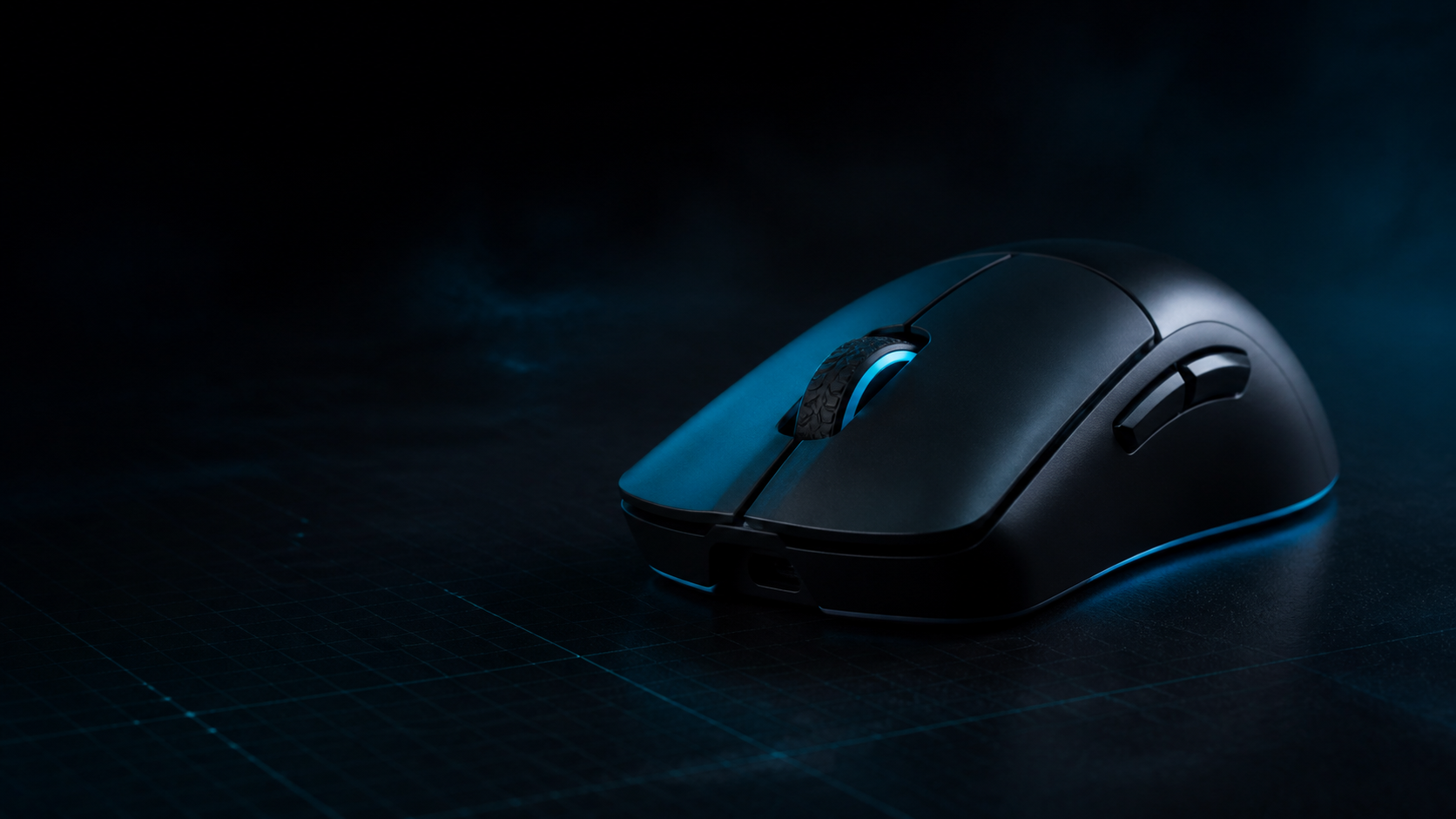 Wireless gaming mouse on a dark technical surface